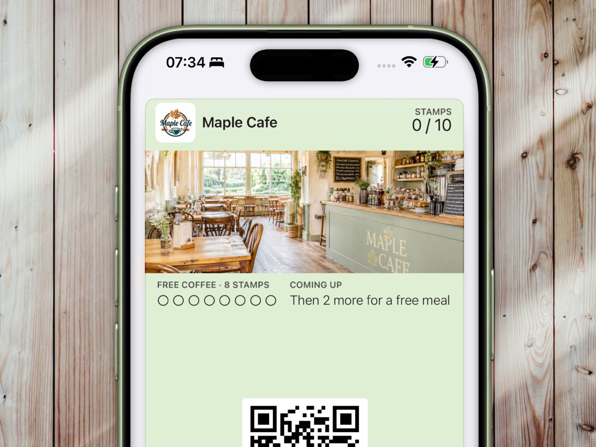 iPhone showing Candour loyalty stamp card with Apple Wallet pass